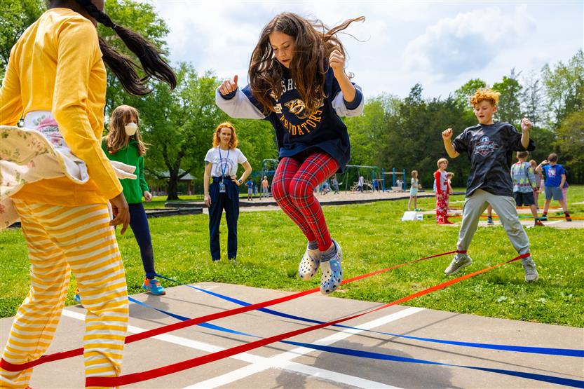 Students dance outside
